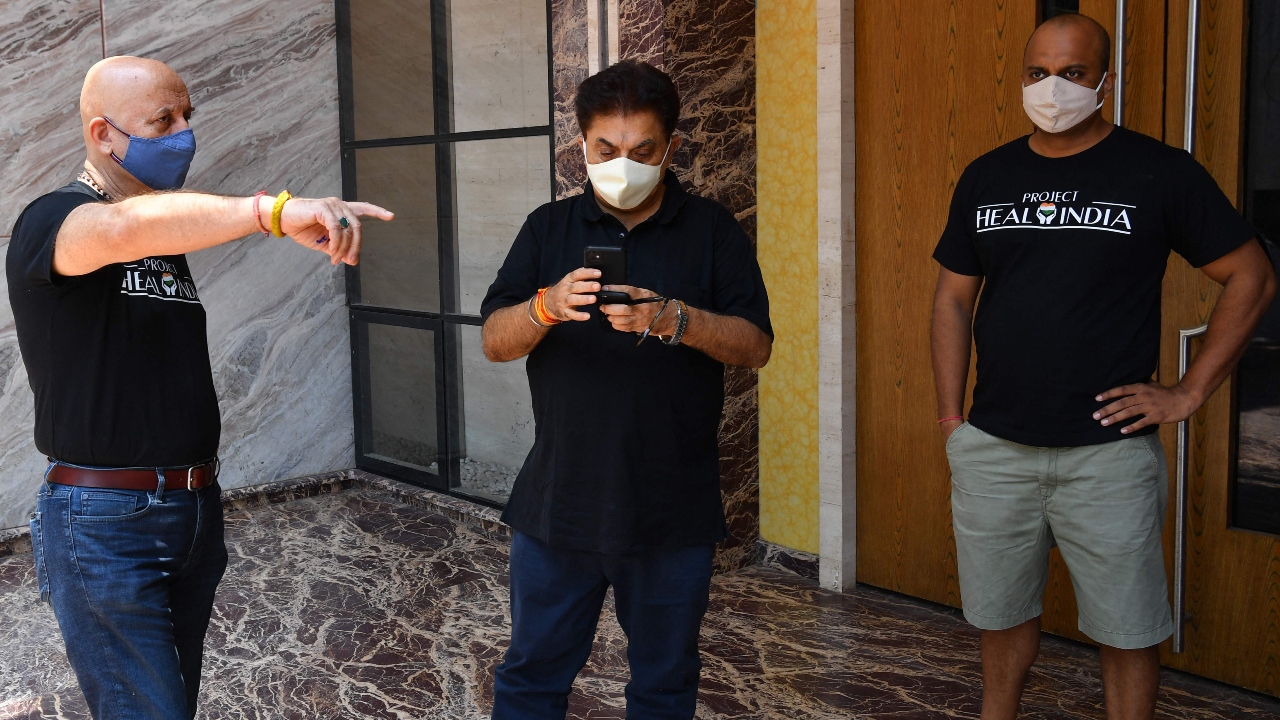 Anupam Kher and Ashoke Pandit take part in an initiative to provide ventilators, oxygen concentrator and other essential equipment around India as part of 'Project Heal India' to fight against the Covid-19 coronavirus pandemic, in Mumbai.