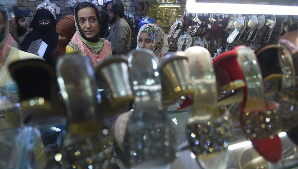 People at a market area ahead of the upcoming festival of Eid ul-Fitr in Karachi, Pakistan. Credit: AFP Photo