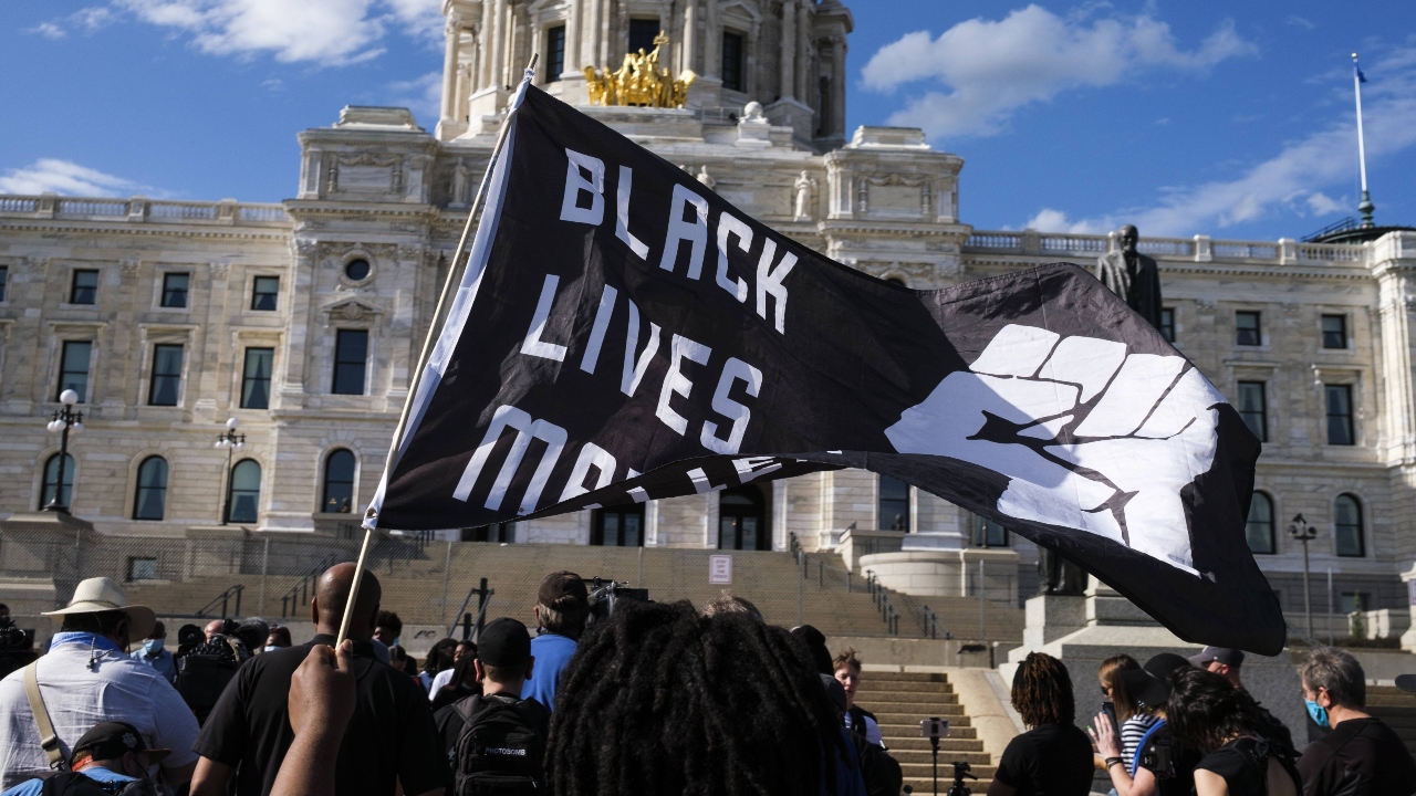 The site of Floyd's death, 38th and Chicago, was taken over by activists soon after and remains barricaded to traffic. Credit: AFP Photo