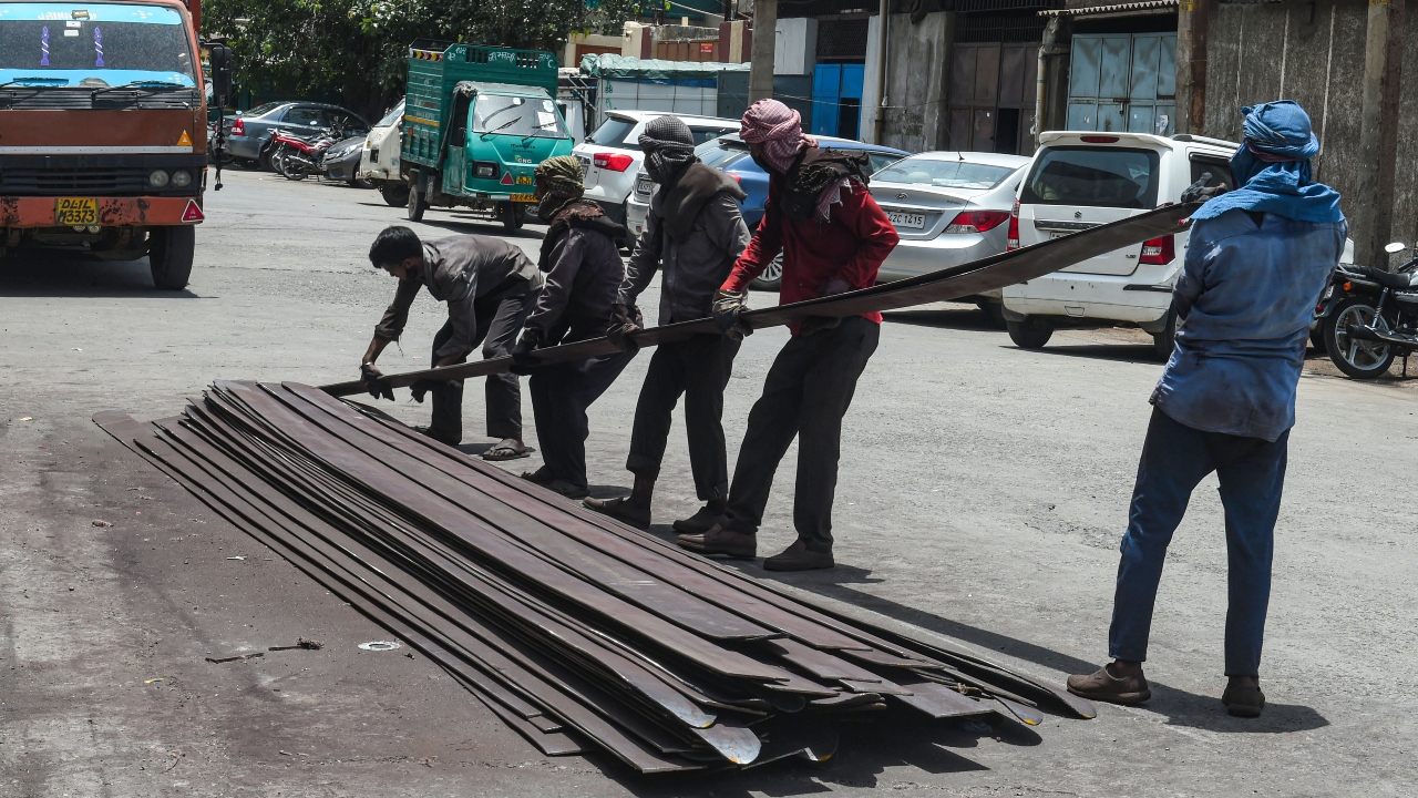 As Covid lockdown restrictions were eased in Delhi, factory owners opened their establishments after six weeks with many grappling with shortage of labourers and raw materials, and fearing losses due to slump in production. Credit: PTI Photo