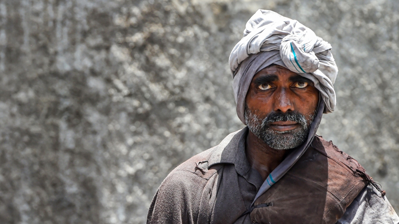 A portrait of a labour at the Wazirpur Industrial area, as the unlocking process of Covid-19 lockdown begins in New Delhi. Credit: PTI Photo