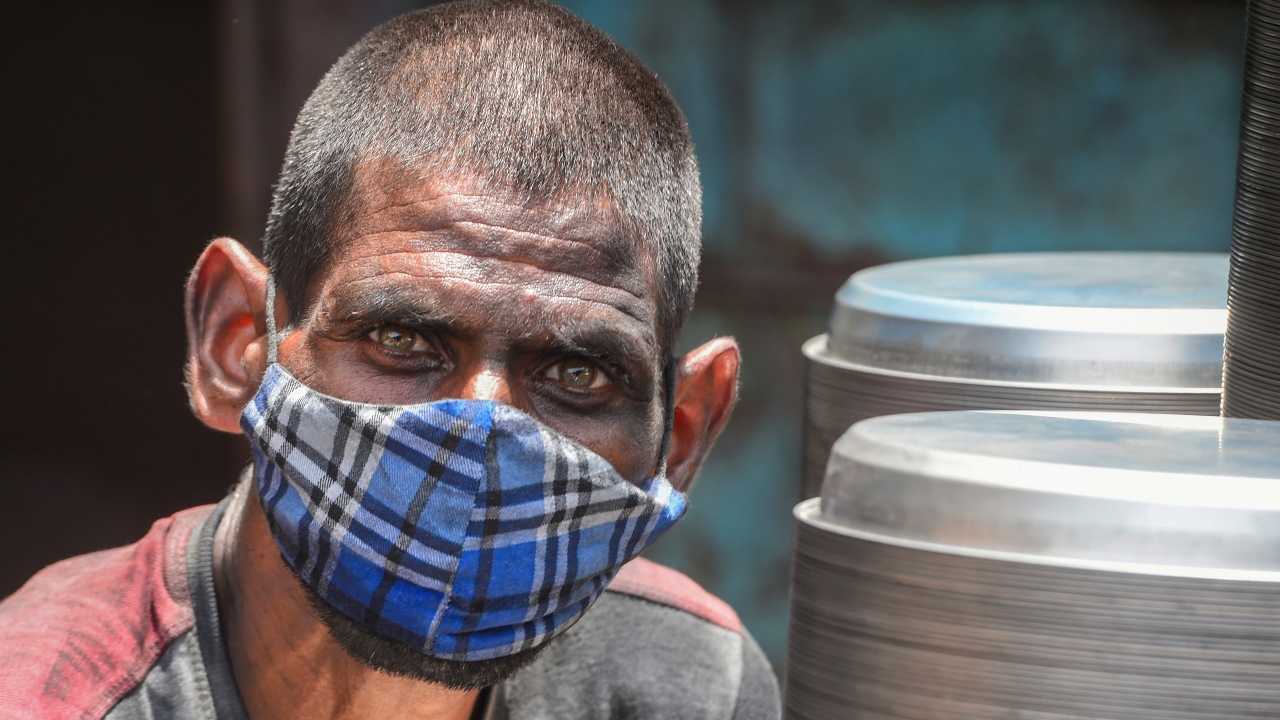 Another worker at the Wazirpur Industrial area. Credit: PTI Photo