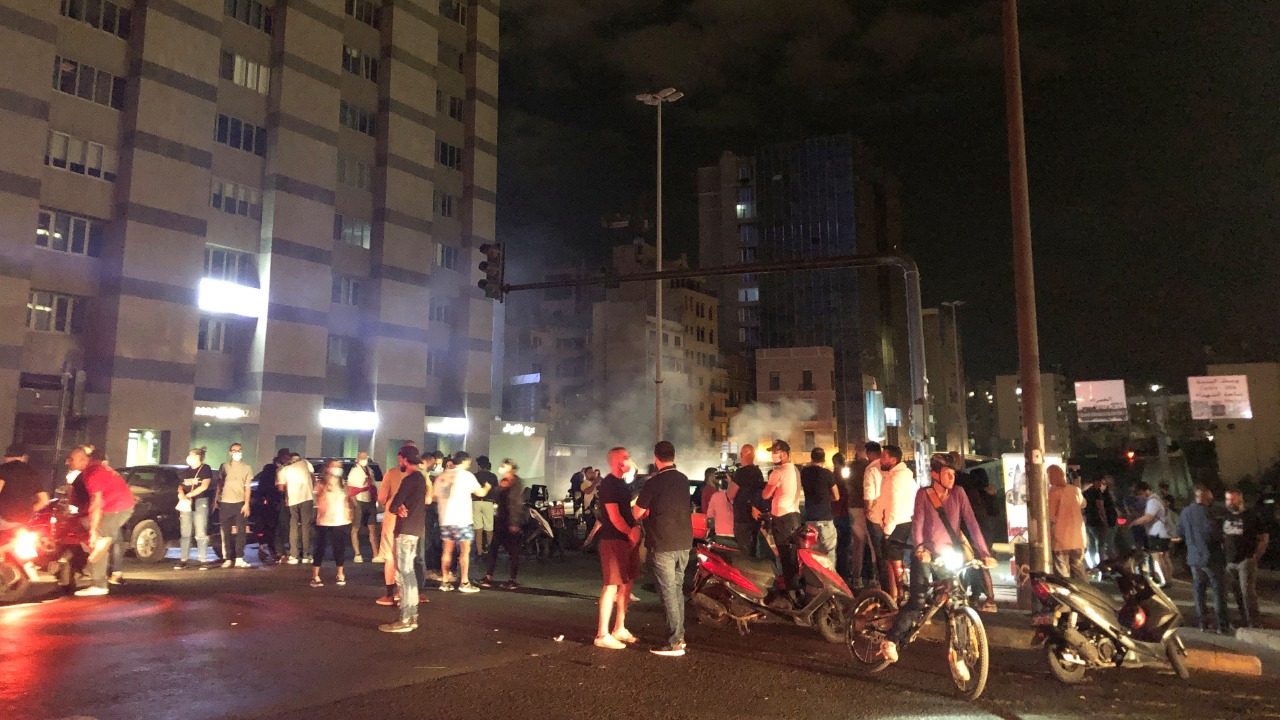 Demonstrators block a road during a protest, after Lebanon's Central Bank said it would stop bank withdrawals from dollar accounts at low fixed rate, in Beirut, Lebanon June 3, 2021. Credit: Reuters Photo