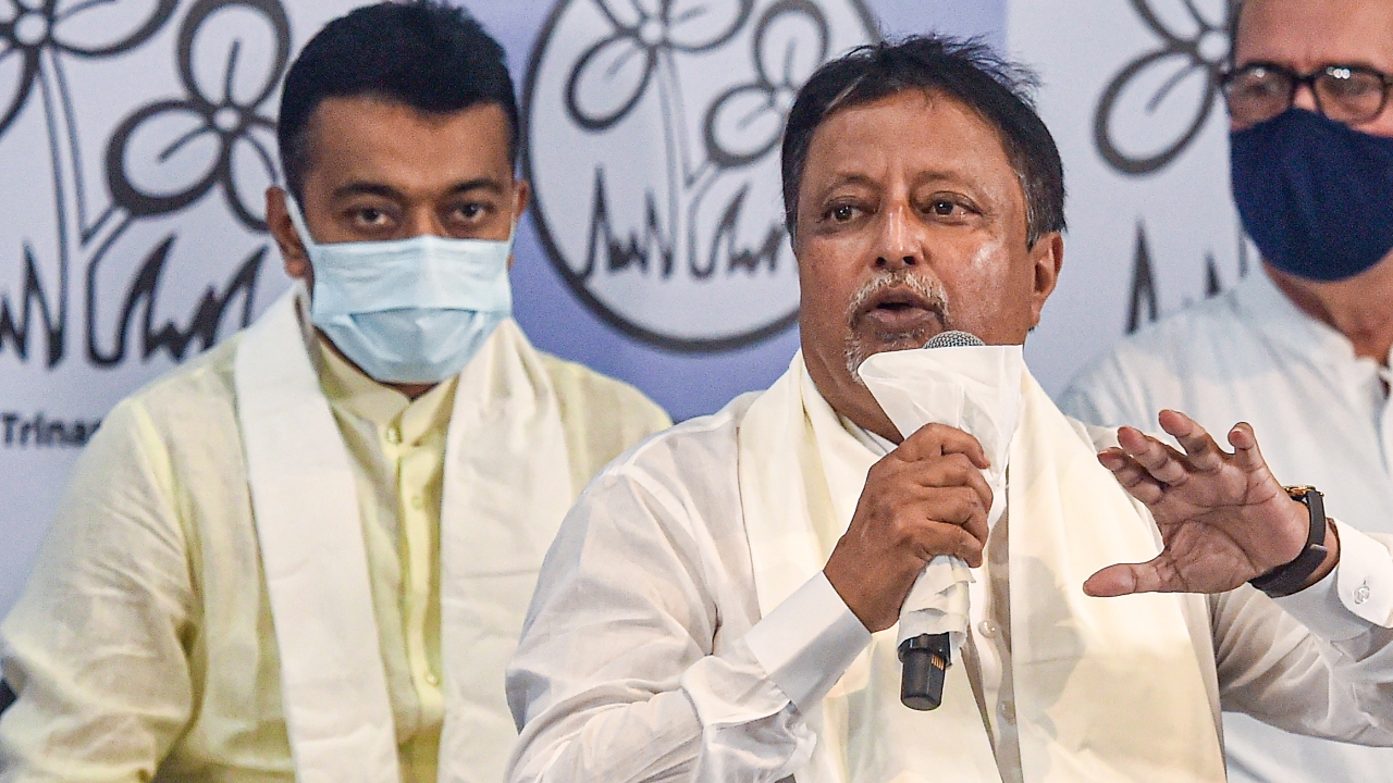 BJP leader Mukul Roy addresses the gathered media after joining TMC in Kolkata on June 11, 2021.