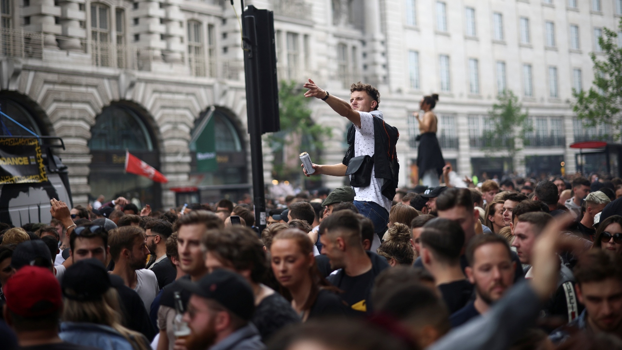 Demonstrators raise slogans during the 'Save Our Scene' protest in London.