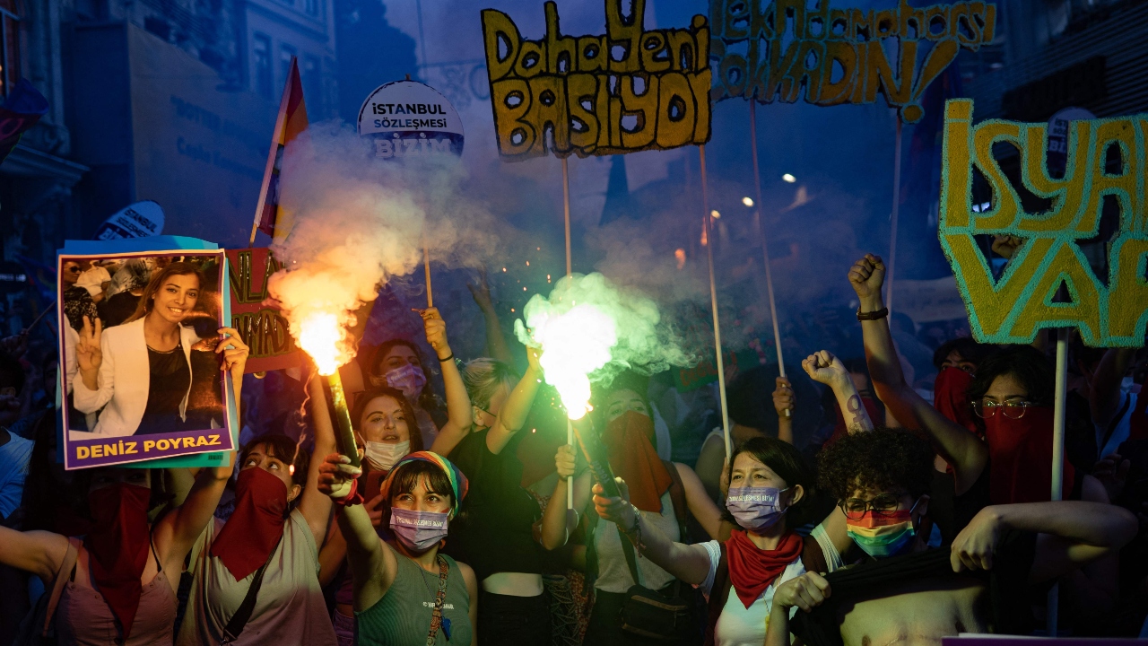 Women chant slogans and hold placards as they take part in a demonstration to protest against Turkey's decision to withdraw from the Istanbul Convention that turned into clashes with Turkish police, in Istanbul. Credit: AFP Photo