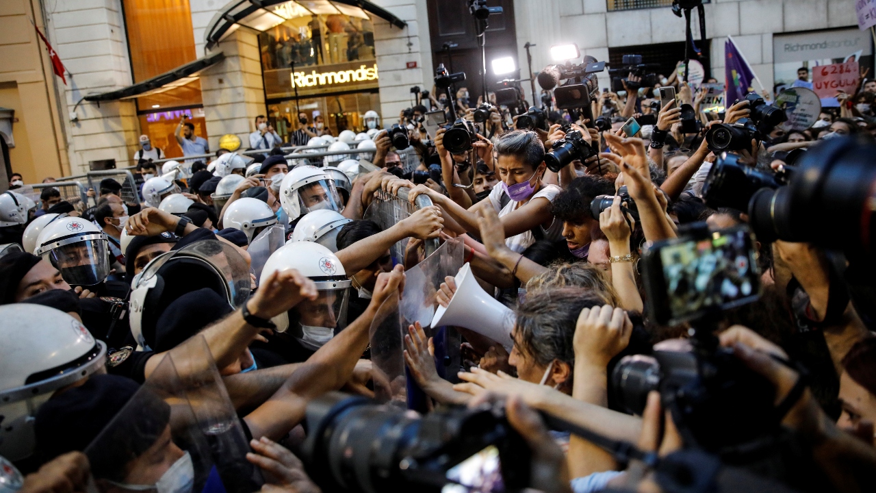 People scuffle with police during a protest against Turkey's withdrawal from the Istanbul Convention, an international accord designed to protect women, in Istanbul. Credit: Reuters Photo