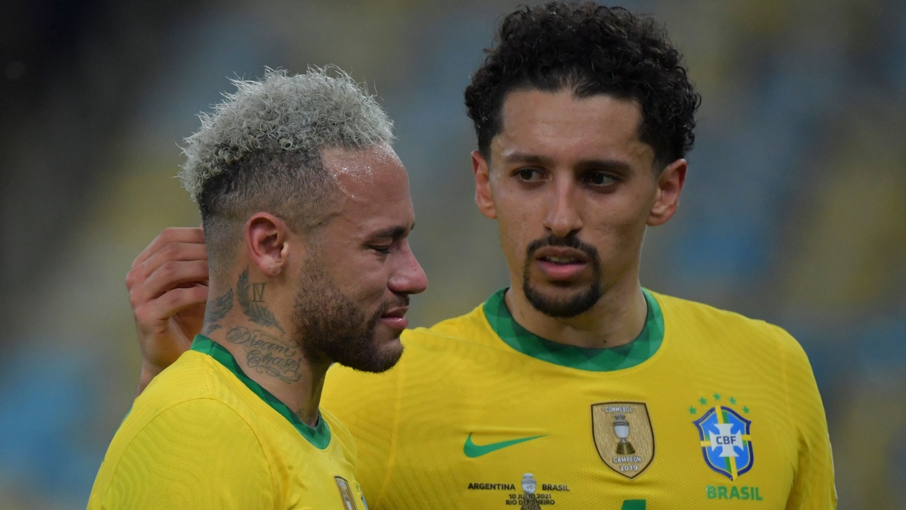 Brazil's Neymar is comforted by teammate Marquinhos. Credit: AFP Photo