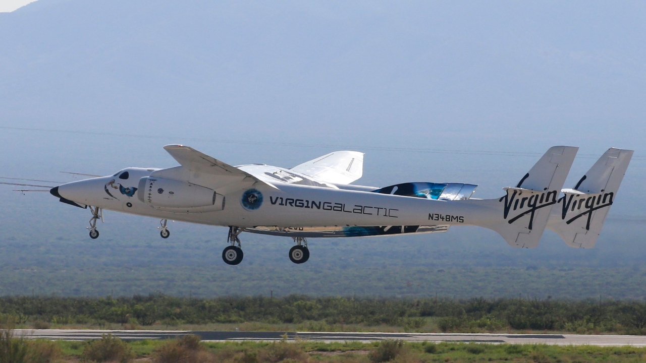 Virgin Galactic's passenger rocket plane VSS Unity, borne by twin-fuselage carrier jet dubbed VMS Eve, took off to the edge of space at Spaceport America. Credit: Reuters Photo