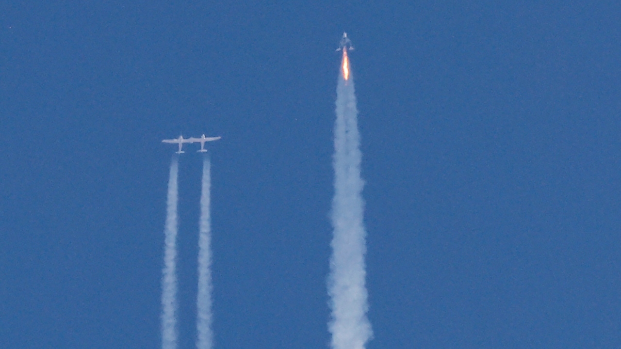 The spaceplane's contrail was clearly visible from the ground as it soared through the upper atmosphere, to the cheers of the crowd below. Credit: Reuters Photo