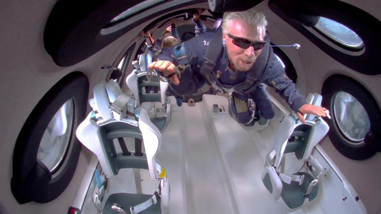 Richard Branson floats in zero gravity on board Virgin Galactic's passenger rocket plane VSS Unity after reaching the edge of space. Credit: Virgin Galactic/Handout via Reuters