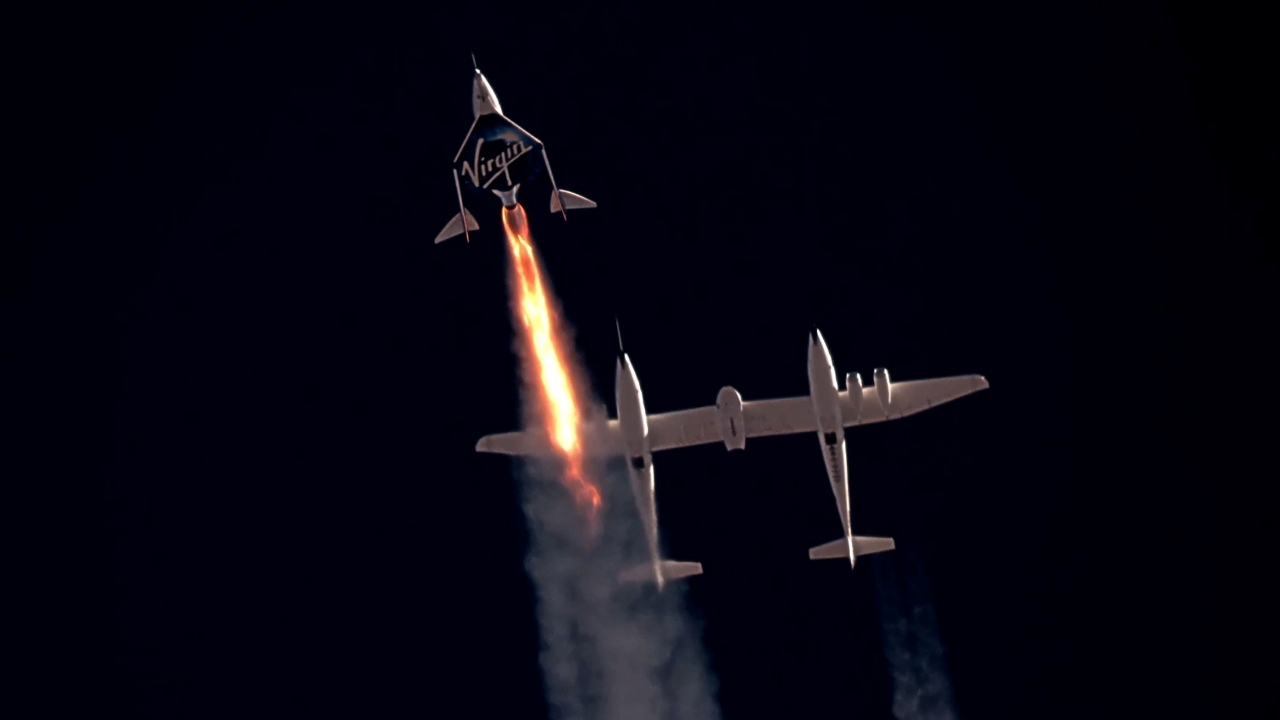 Reaching its high-altitude launch point at about 46,000 feet, the VSS Unity passenger rocket plane was released from the mothership and fell away as the crew ignited its rocket, sending it streaking straight upward at supersonic speed to the blackness of space some 53 miles (86 km) high. Credit: Reuters Photo