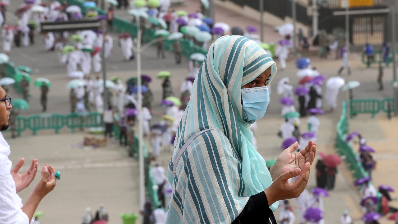 Thermal cameras at entrances to the Grand Mosque monitor people's temperatures. Around 3,000 electric carts have been provided for pilgrims, who also wear electronic identification bracelets connected to GPS. Credit: Reuters Photo