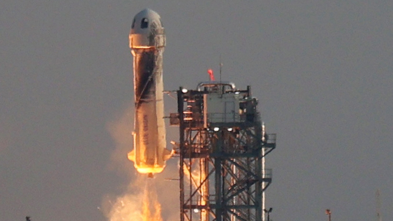 Blue Origin’s New Shepard lifts-off from the launch pad carrying Jeff Bezos along with his brother Mark Bezos, Oliver Daemen and Wally Funk. Credit: AFP Photo