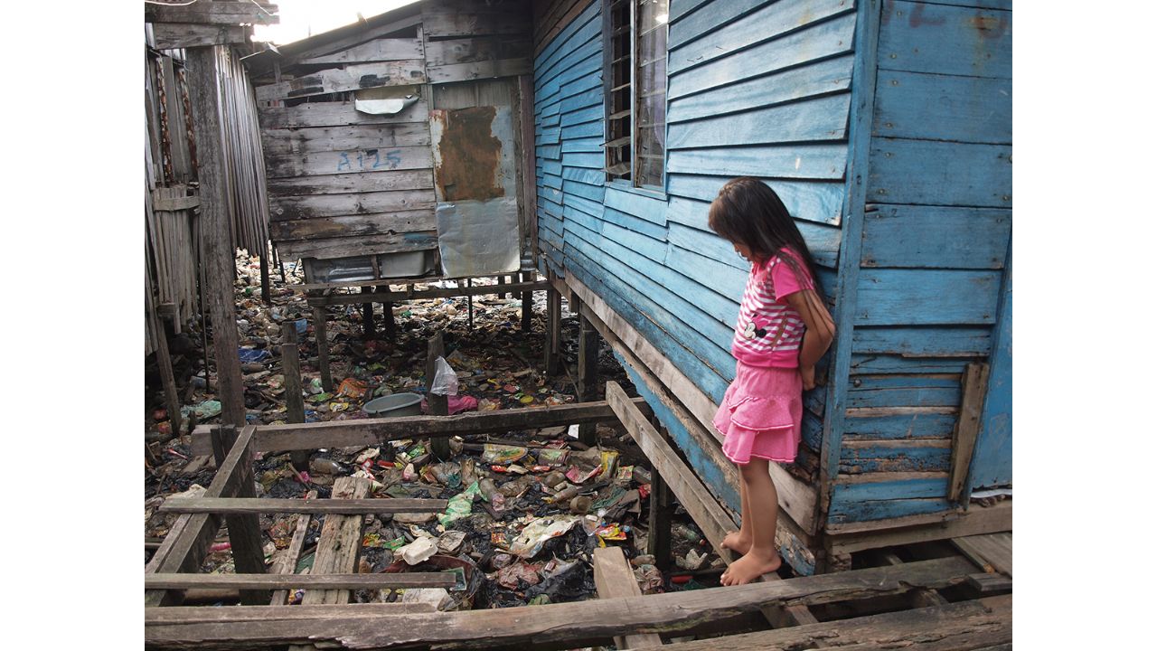 Garbage piles collected in several such areas are estimated to amount to 216,000 kilograms per month. This girl is growing up in a squatter settlement around Sabah, Malaysia. Photo by Fakir Mohamad bin Md. Nor (Malaysia)