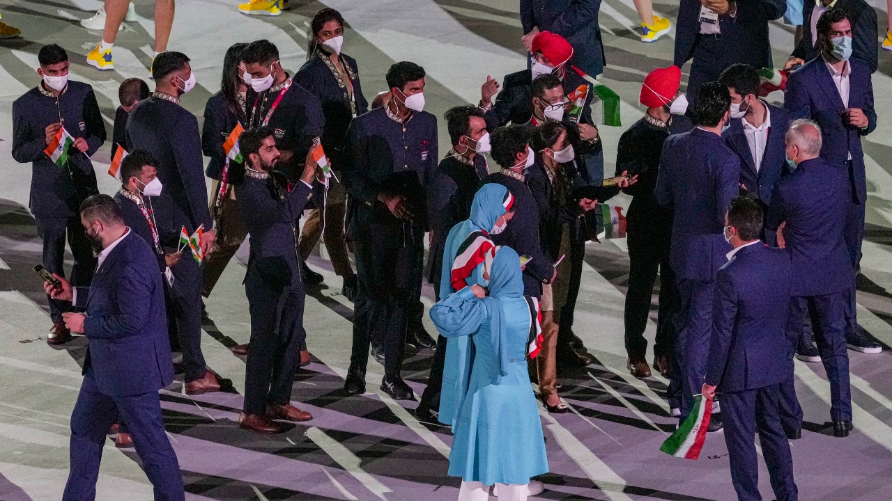 Indian contingent marches past at the Olympic Stadium during the opening ceremony of the Summer Olympics 2020 in Tokyo. Credit: PTI Photo