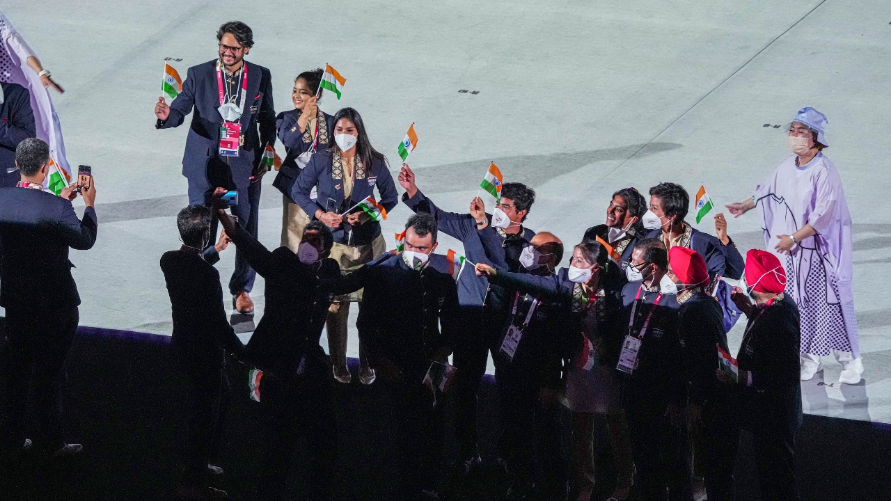 Indian athletes take selfies at the Olympic Stadium during the opening ceremony of the Summer Olympics 2020 in Tokyo. Credit: PTI Photo