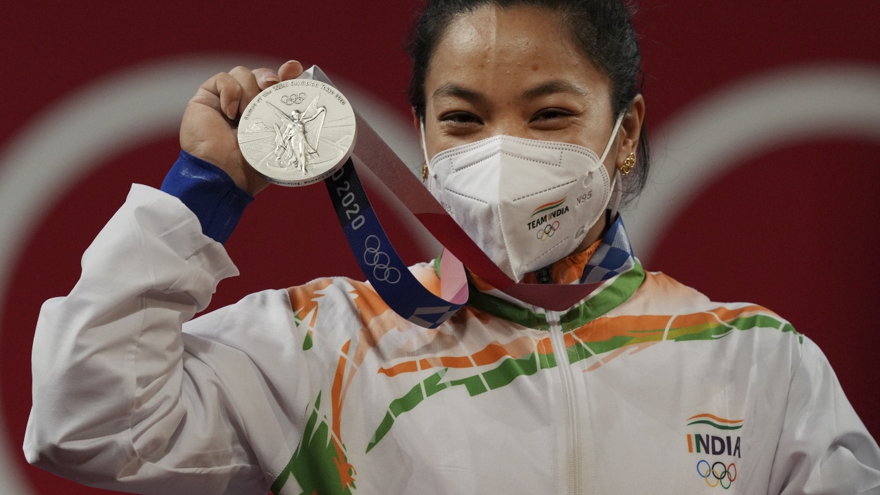 Her smile shone the brightest during the entire performance but also hard to miss were the Olympic rings' shaped earrings that she was sporting, which were a gift from her mother. Credit: PTI Photo