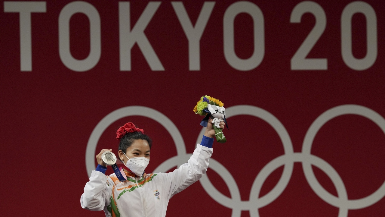 Later she broke into a punjabi bhangra too to celebrate the historic podium finish. Credit: PTI Photo