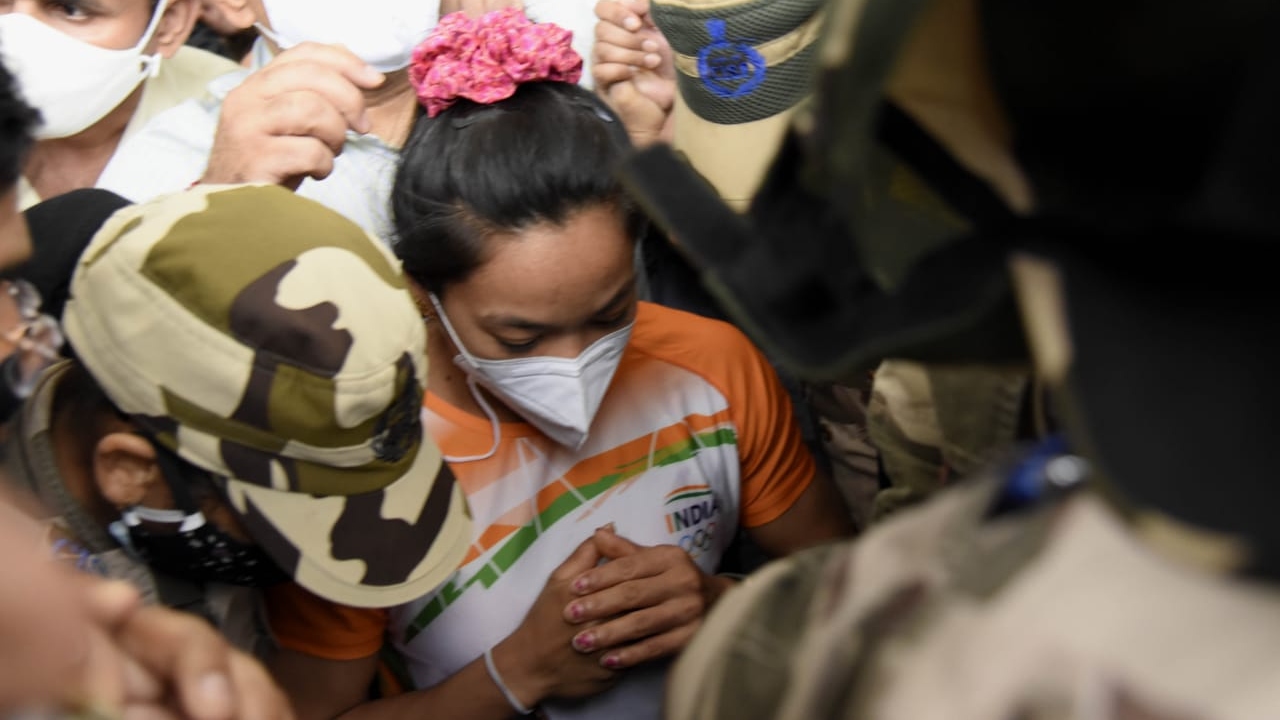 She was safely escorted out of the airport by security personnel. Credit: Amlan Paliwal