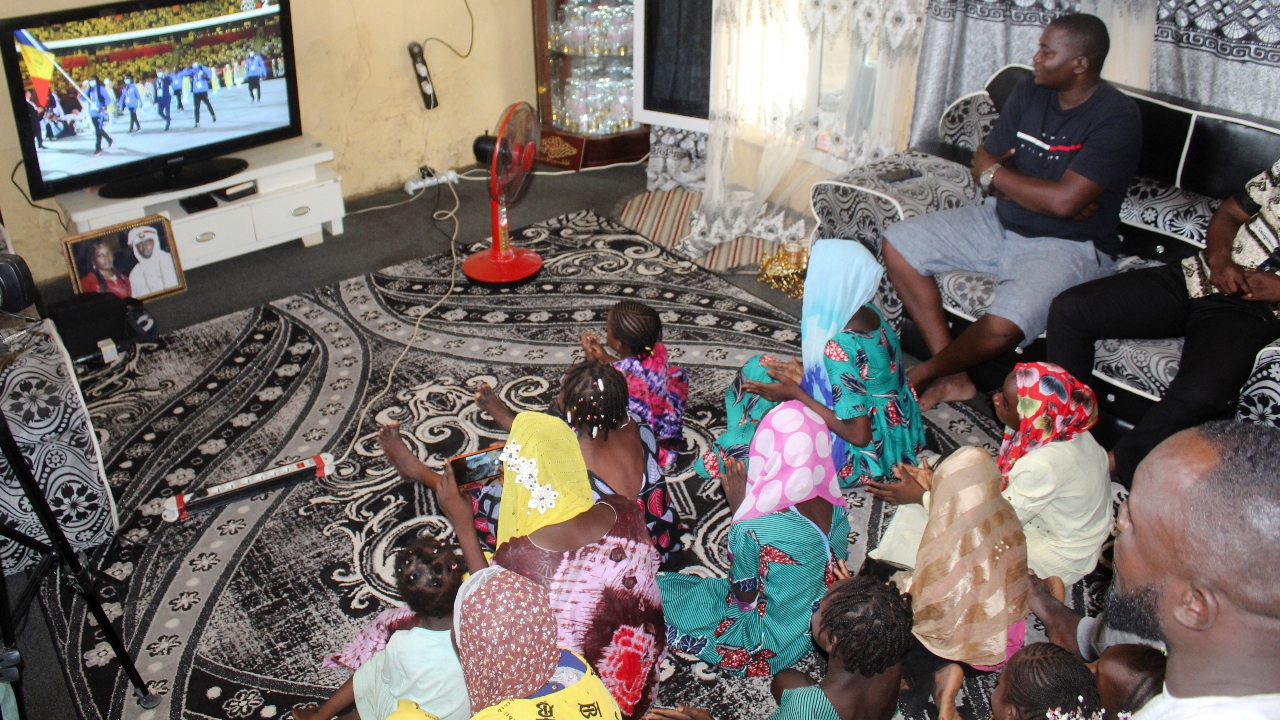 Family members of Demos Memneloum, first female Chadian judo athlete, watch the match. Credit: Reuters Photo