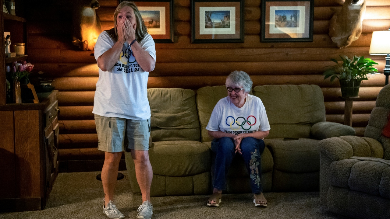 US swimmer Hunter Armstrong's mother Edie Armstrong cheers for him from their home during the 2021 Olympic Games, in Dover, Ohio, US. Credit: Reuters Photo