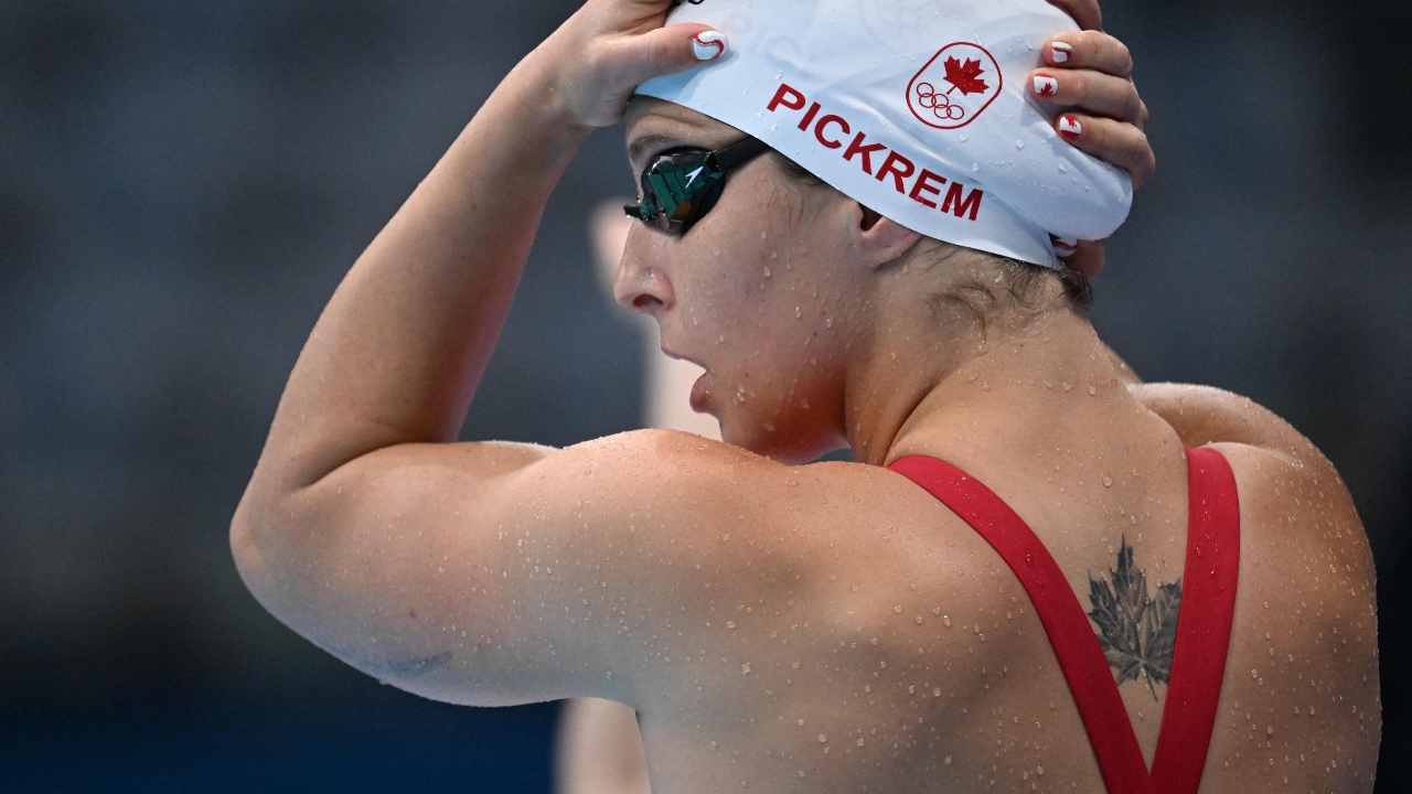 Canada's Sydney Pickrem has a popular maple leaf tattoo on her back. Credit: AFP Photo