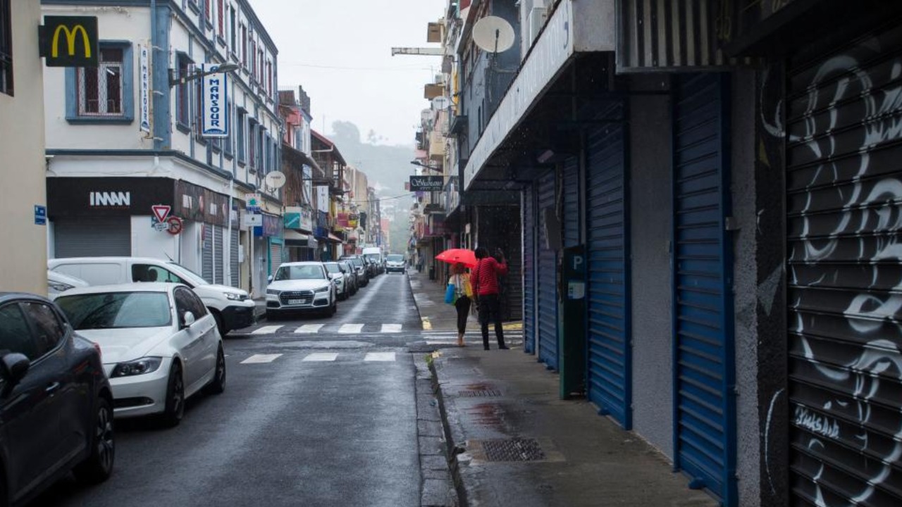 This picture shows almost empty streets and close stores during a strict lockdown in the city centre in Fort-de-France, in the French Caribbean island of Martinique. Credit: AFP Photo