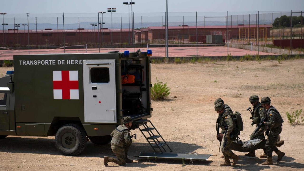 Spanish paratrooper and Afghanistan war veteran Gonzalo Seguel (L) takes part in military exercises at the Parachute Brigade (BRIPAC) base in Paracuellos del Jarama near Madrid on July 20, 2021. Credit: Reuters Photo