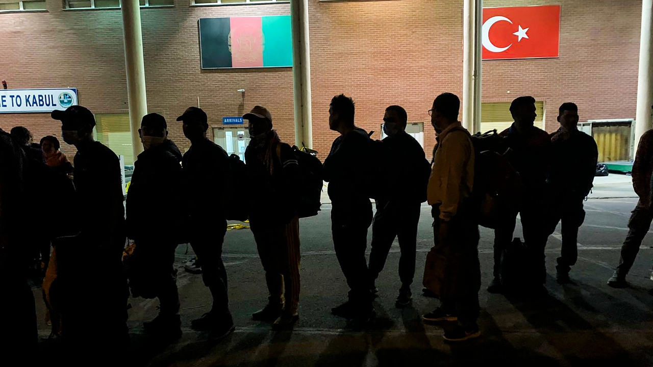 Sleepless, hungry and scared, people are waiting for hours at the airport to board a flight. Credit: AFP Photo