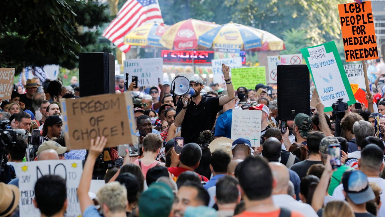 People gather during a protest against mandated Covid-19 vaccines and vaccine passports, at City Hall in Manhattan, New York City. Credit: Reuters photo