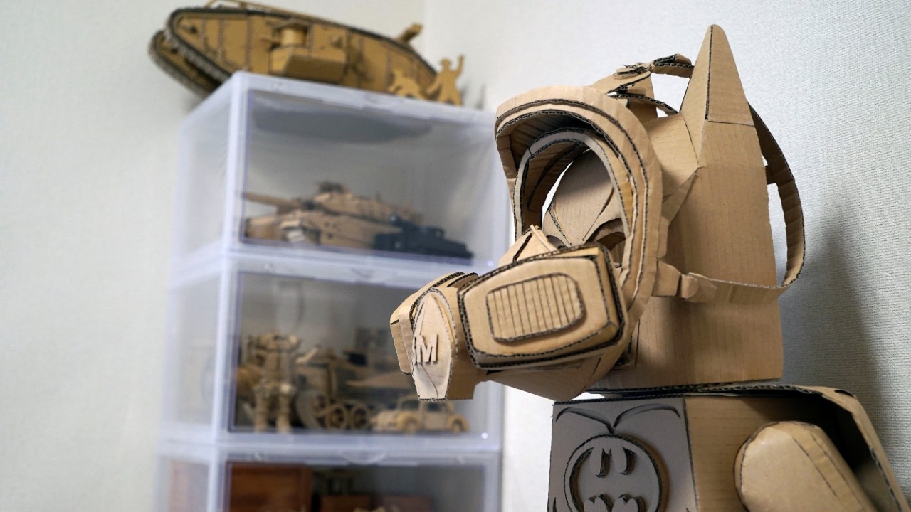 A cardboard sculpture of a Lego character wearing a gas mask is displayed in 29-year-old artist Monami Ohno's room in Tokyo, Japan. Credit: Reuters Photo