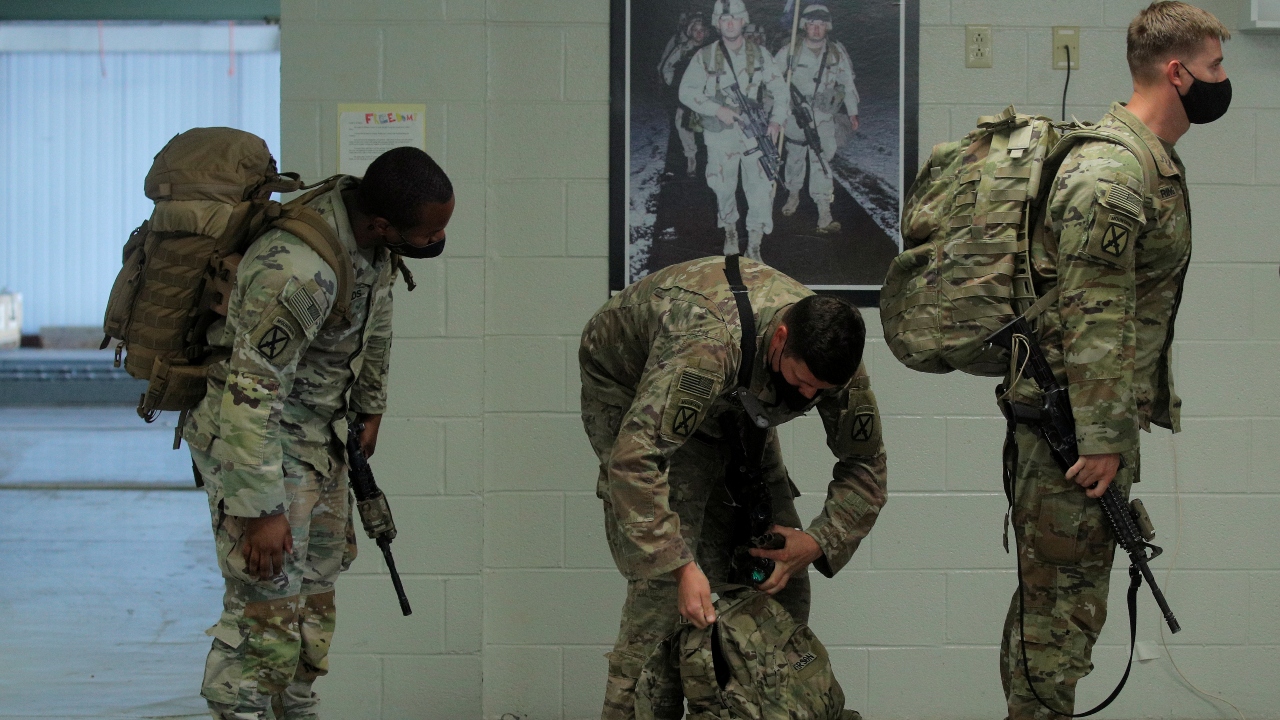 US Army soldiers are processed upon returning home from deployment in Afghanistan, at Fort Drum in New York. Credit: Reuters Photo