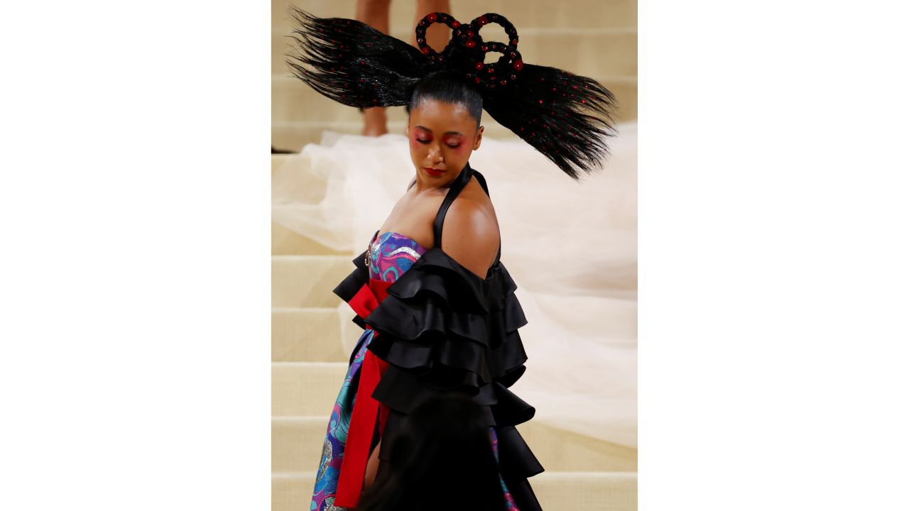 Tennis player Naomi Osaka wore a Japanese-inspired blue-and-red gown with a dramatic headpiece. Credit: Reuters Photo