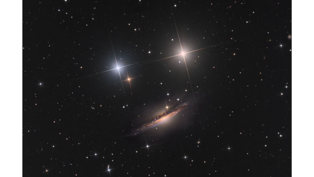 Galaxies Highly Commended: A Smiley in Space. Credit: Royal Observatory Greenwich’s Astronomy Photographer of the Year 13 (2021) competition/exhibition - Nicolas Rolland (France) and Martin Pugh (Australia)