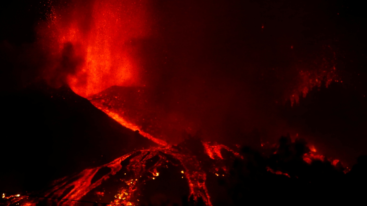 Lava flows downhill following the eruption of a volcano in the Cumbre Vieja national park at El Paso, on the Canary Island of La Palma. Credit: Reuters Photo