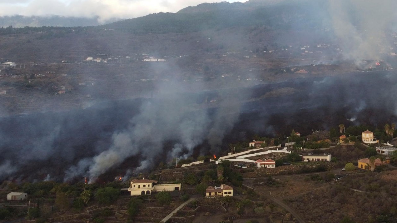 Smoke rises from an erupting volcano in the Cumbre Vieja national park at Los Llanos de Aridane, on the Canary Island of La Palma, Spain. Credit: Reuters photo