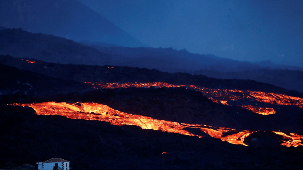The Cumbre Vieja volcano spews lava as it continues to erupt on the Canary Island of La Palma, as seen from Tajuya, Spain. Credit: Reuters Photo