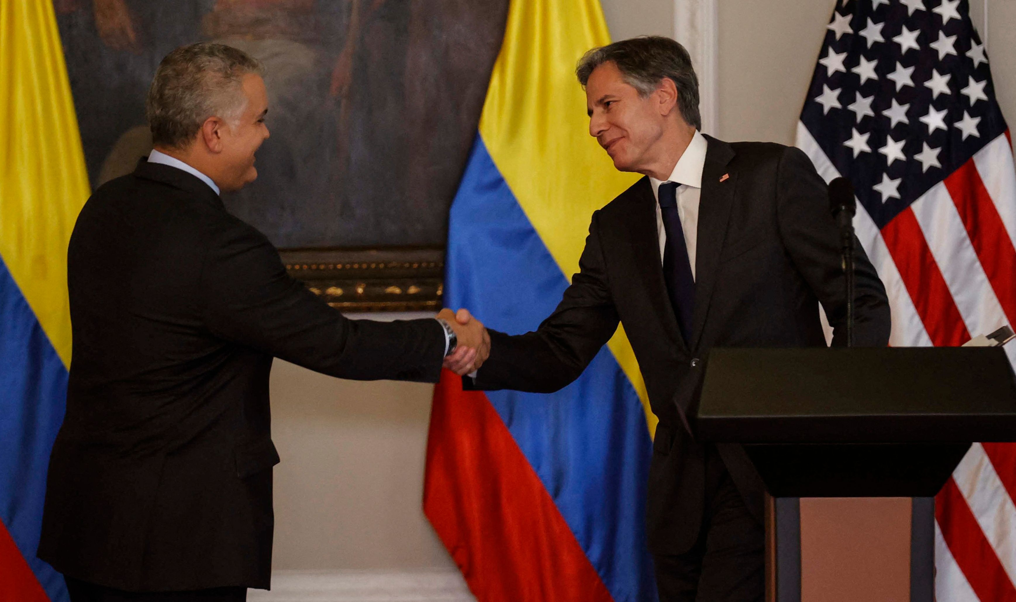 US Secretary of State Antony Blinken (R) and Colombia's President Ivan Duque shake hands after addressing the media, in Bogota. Credit: AFP Photo