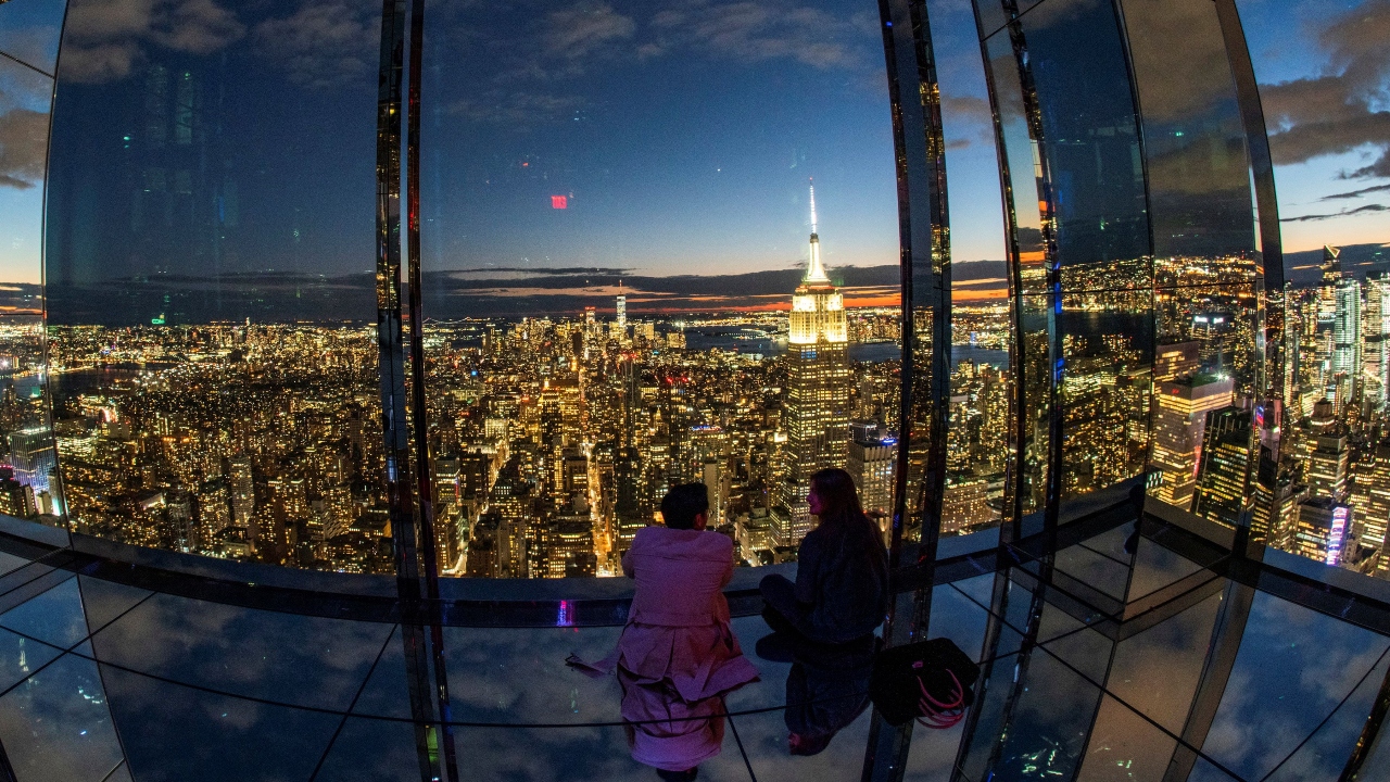 In these skyscrapers you are in the middle of everything, and you get to watch a cloud roll over the city. Credit: Reuters Photo