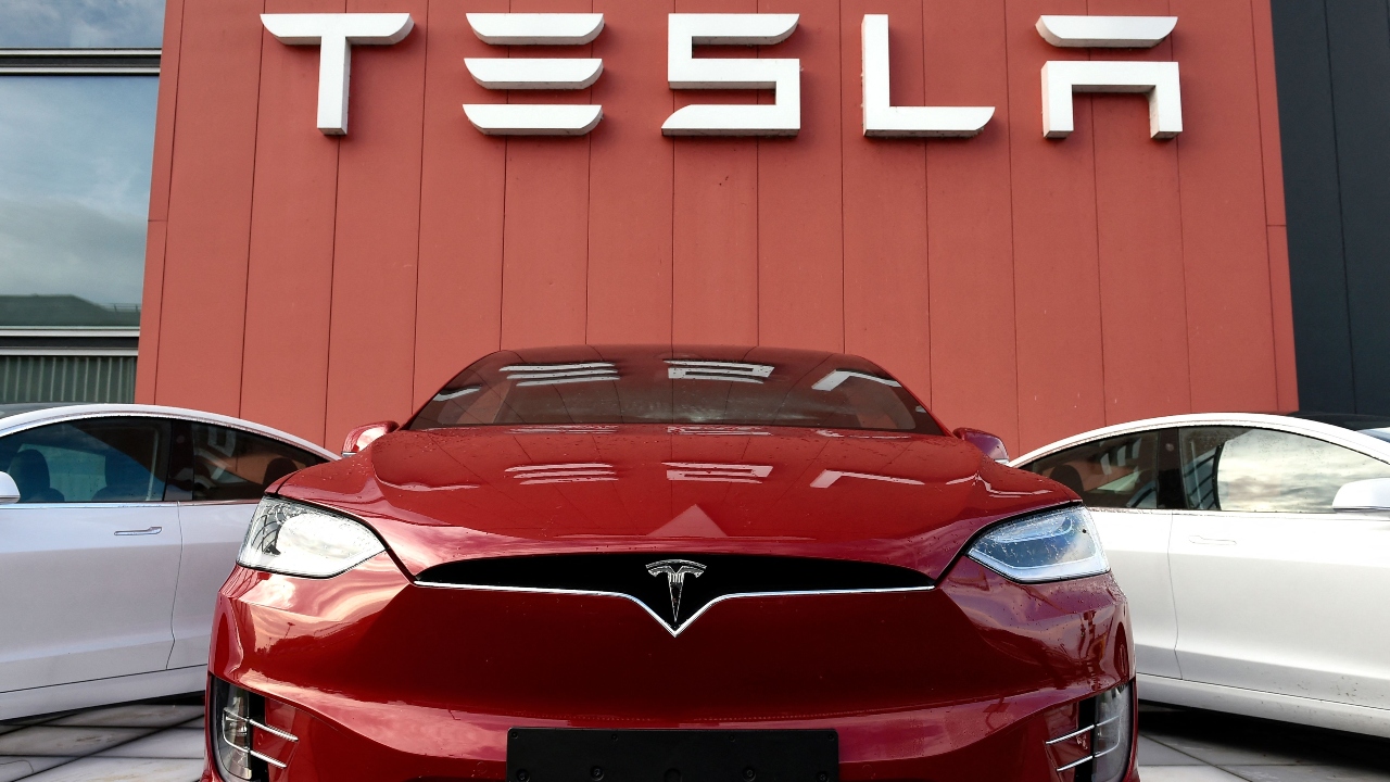 Tesla | An American electric vehicle and clean energy company is the latest entrant in the $1-trillion club. Elon Musk’s Tesla became the sixth company in the US to be worth $1 trillion. It took 18 years for the company to hit the $1-trillion mcap milestone and become the world's second-fastest company to achieve this feat. Credit: AFP Photo
