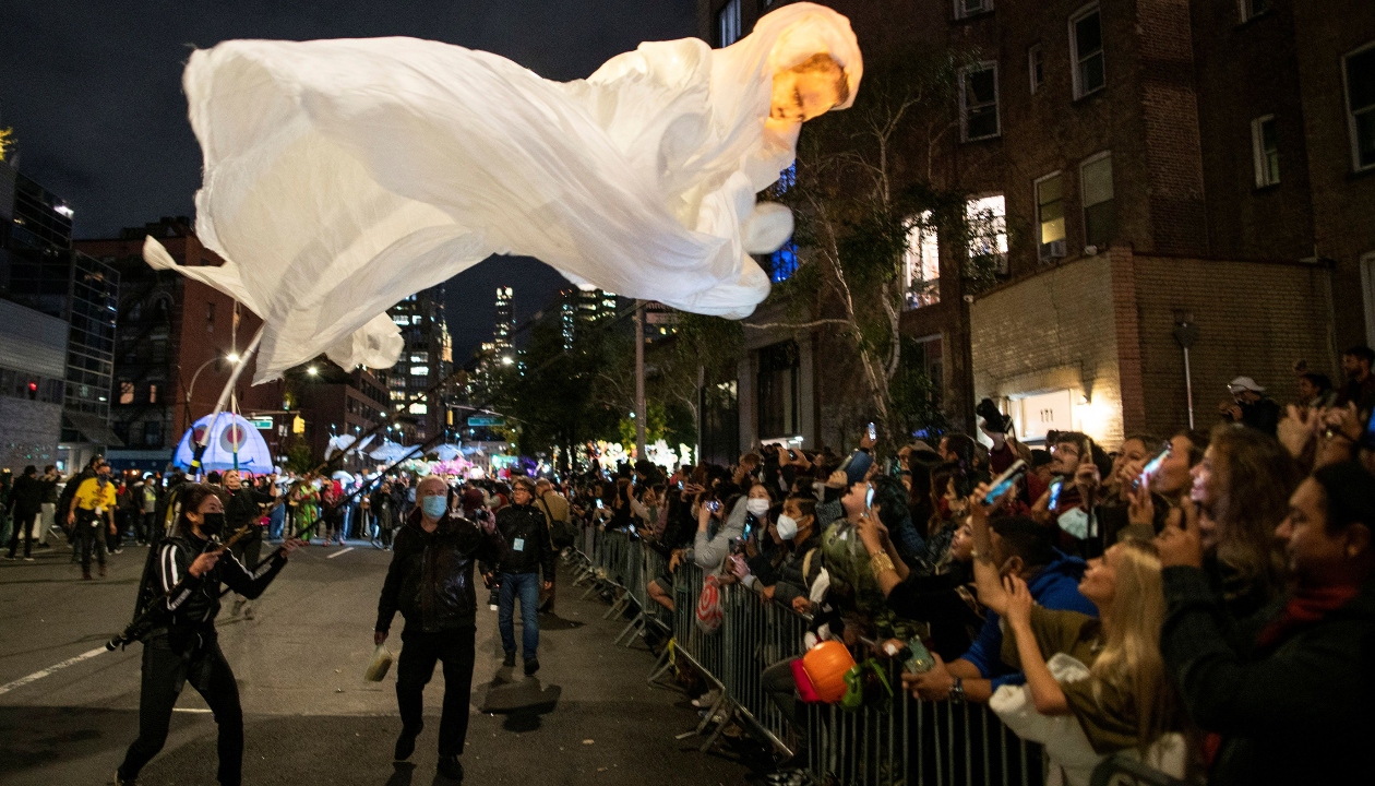 Revellers play with each other as they take part in the NYC Halloween Parade in New York. Credit: Reuters Photo