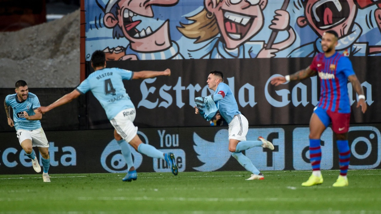 Celta Vigo's Spanish forward Iago Aspas (2ndR) celebrates after scoring a goal during the Spanish league football match against FC Barcelona at the Balaidos stadium in Vigo. Credit: AFP Photo