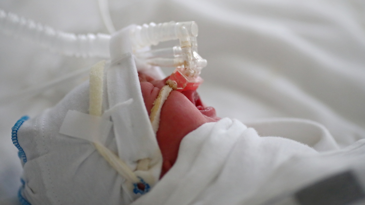 Air pollution reduces the immunity against the infections which lead to cough and cold in new born babies. Credit: Reuters Photo