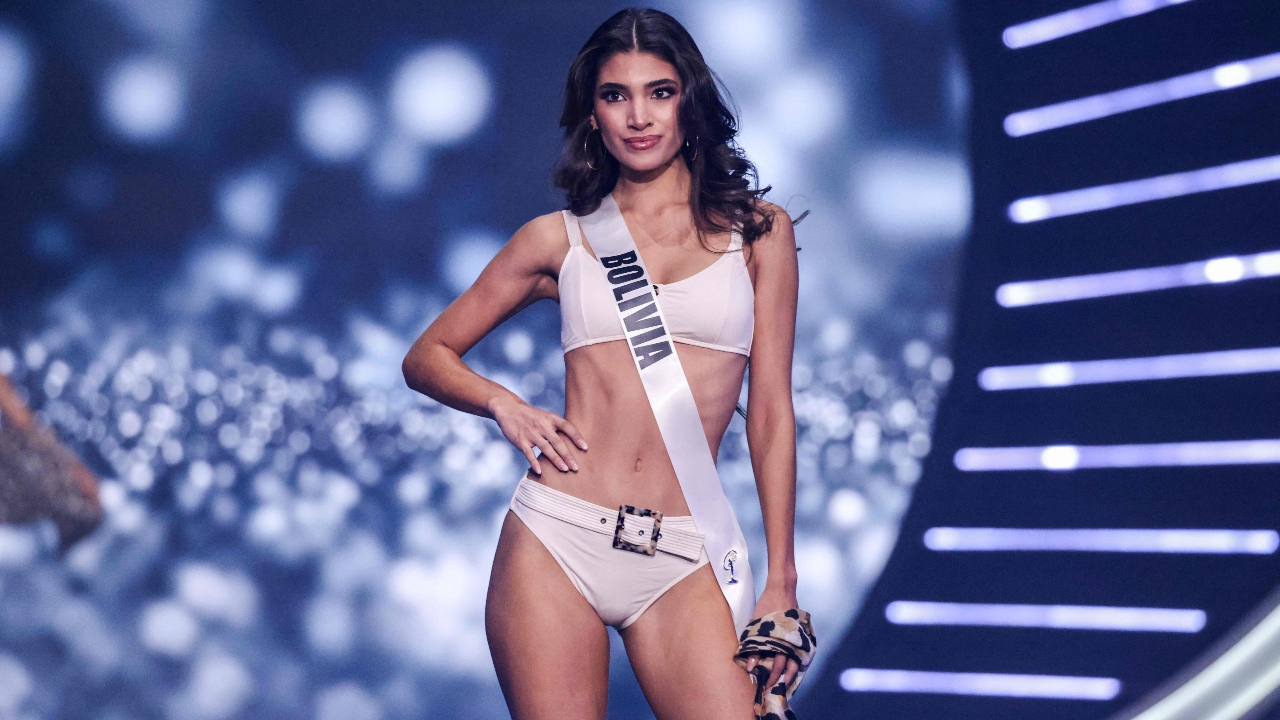 Miss Bolivia, Nahemi Uequin, presents herself in an all-white bikini. Credit: AFP Photo