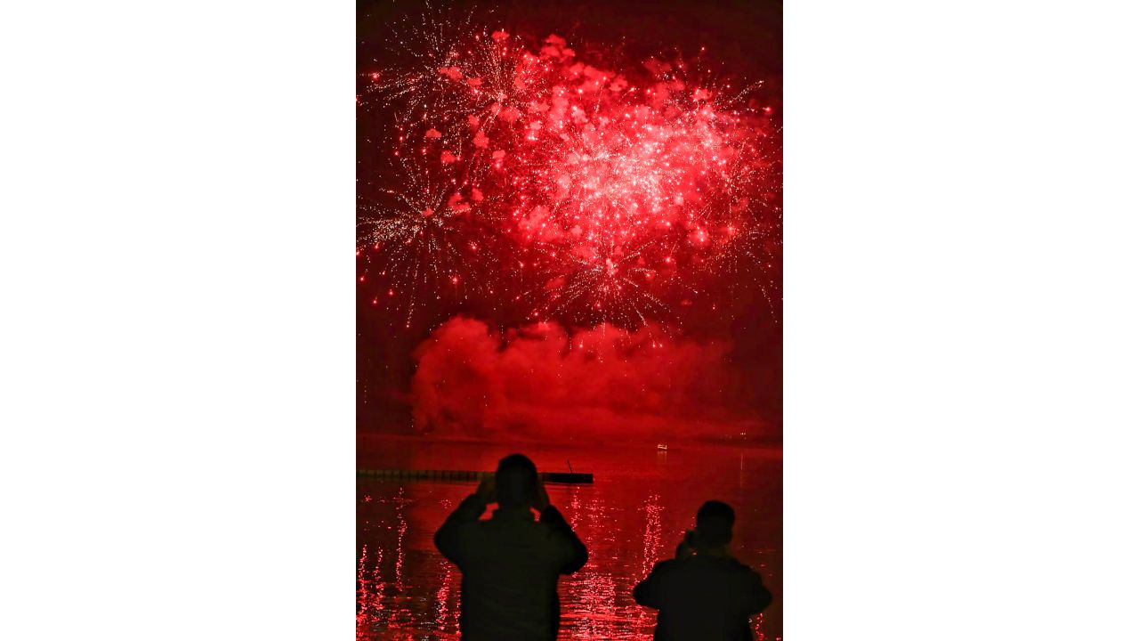 Fireworks light up the sky during the 'Ganga Aarti' at Ganga Ghat in Varanasi. Credit: PTI Photo