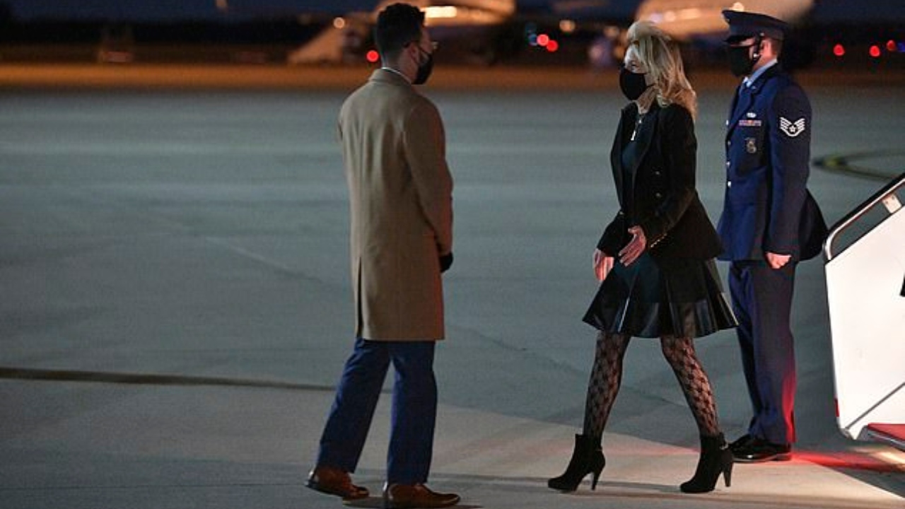 US First Lady Jill Biden disguised herself as a flight attendant on Air Force One to hand out ice cream to reporters on April Fools' Day. Credit: AP Photo