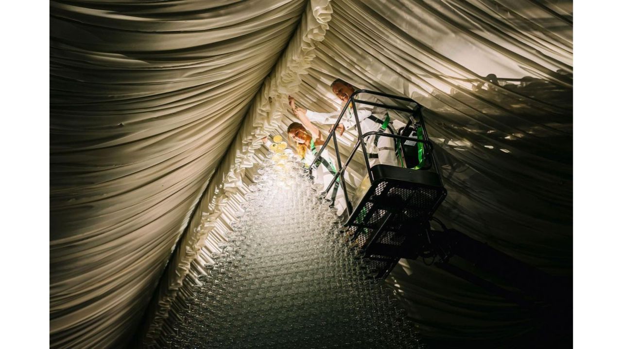 Workers are seen building champagne tower at hotel Atlantis The Palm in Dubai. Credit: Instagram/maximecasa
