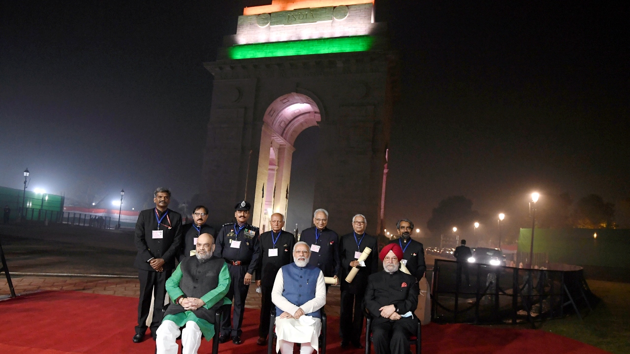 The unveiling event also saw the presence of Home Minister Amit Shah and Housing & Urban Affairs & Minister for Petroleum and Natural Gas Hardeep Singh Puri. In this photo, PM Modi is flanked by Amit Shah and Hardeep Singh Puri. Credit: PMO