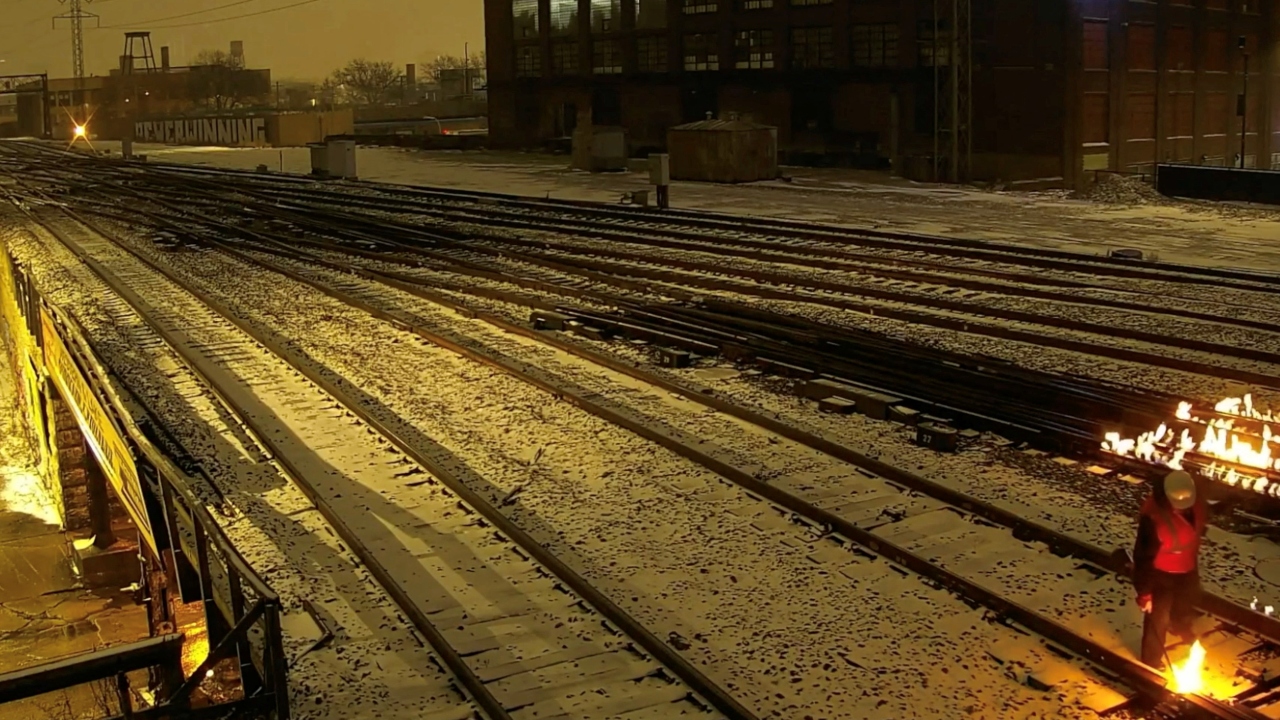 Small fires being lit on railway tracks in Chicago during the freezing temperature so that they don’t freeze in these harsh winter conditions. It might look risky, but flames have kept switches moving and rails intact for over a century. Credit: Reuters Photo